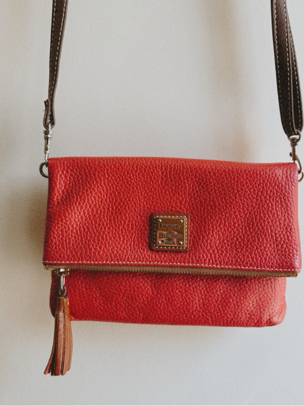 Dooney & Bourke Red Pebble Leather Fold-Over Crossbody with Tassel & Straps